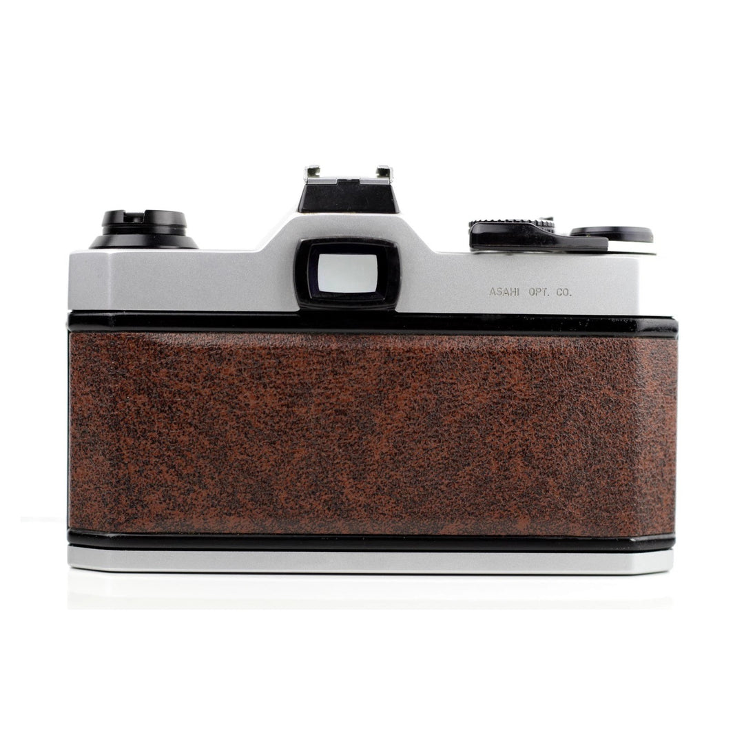 Rear view of brown speckled leatherette Pentax K1000 SE with silver ASAHI OPT engraving from ClubCamera.com