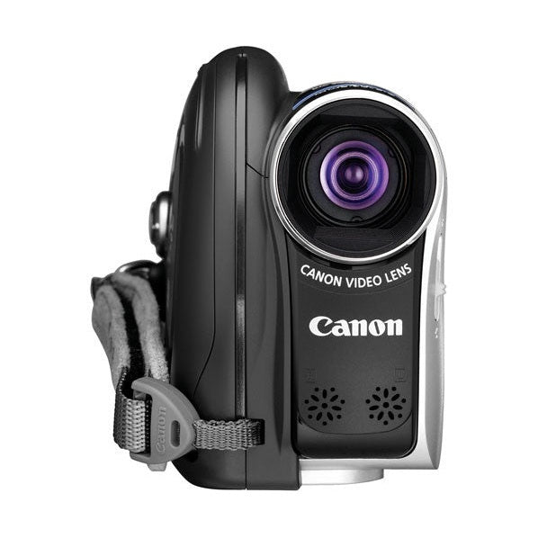 ClubCamera.com black Canon DC310 DVD camcorder front view with purple-tinted video lens and gray woven wrist strap