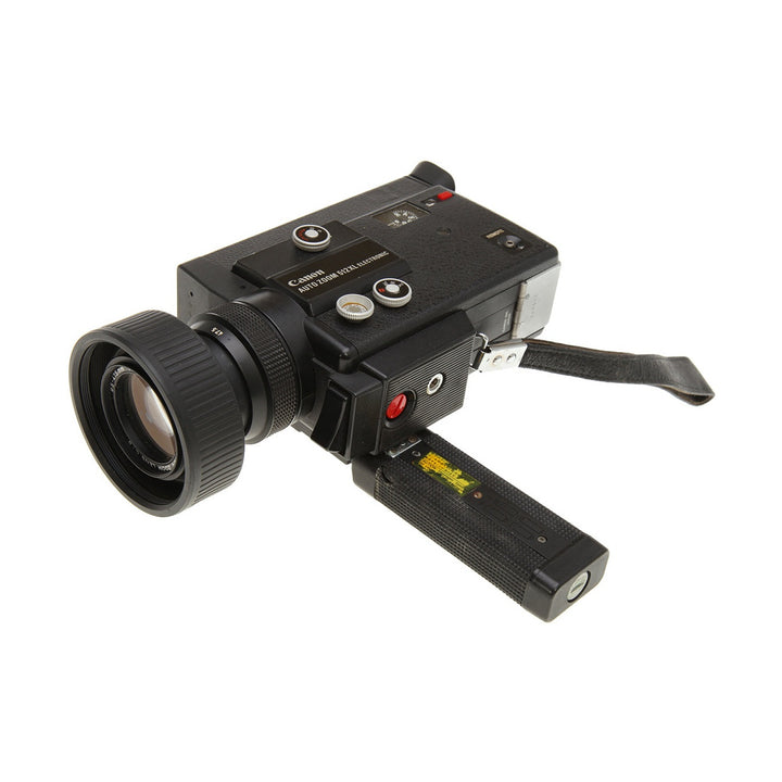 Canon Auto Zoom 512XL Super 8 camera by ClubCamera.com with textured rubber body and silver control dials
