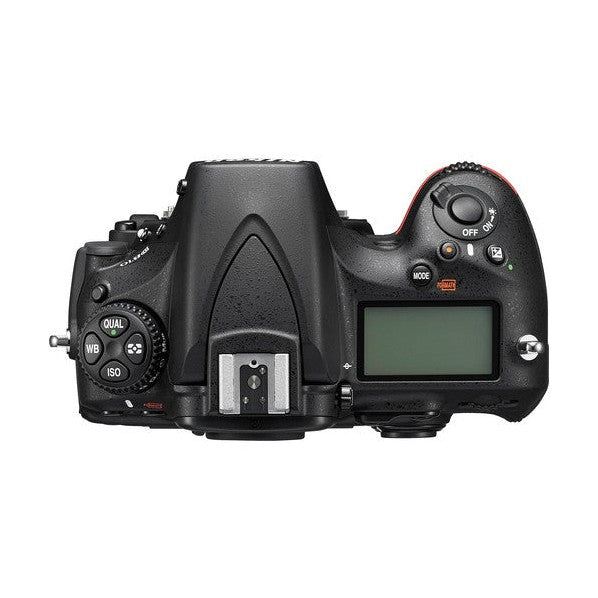 Top view of black Nikon D810 DSLR body showing mode dial and silver flash terminal at ClubCamera.com