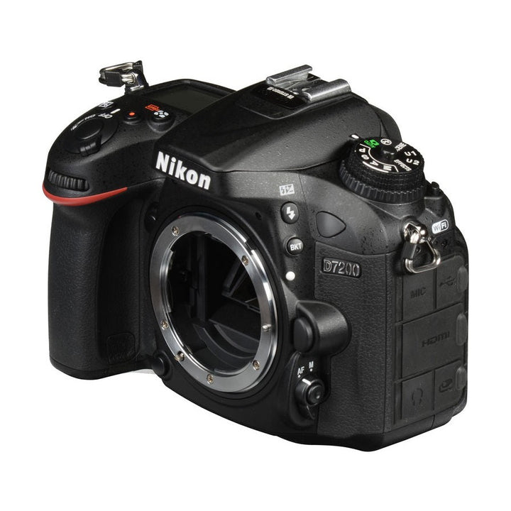 ClubCamera.com front view of black Nikon D7200 DSLR body with exposed lens mount and AUTO mode dial