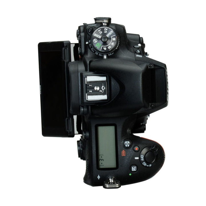 ClubCamera.com Nikon D750 black DSLR camera top-down view showing side flip-out LCD and mode dial settings