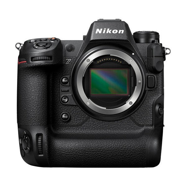 Nikon Z9 mirrorless camera body only front view with black textured grip, silver lens mount, exposed BSI CMOS sensor, and Fn buttons from ClubCamera.com