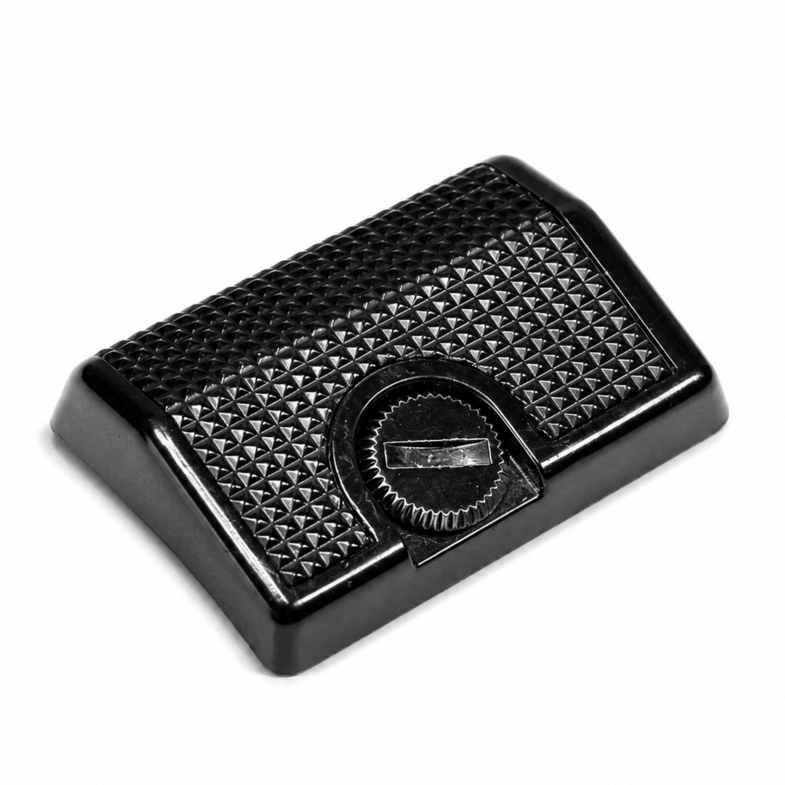 ClubCamera Canon AE-1 Program grip low-angle side view black plastic with textured pyramid surface