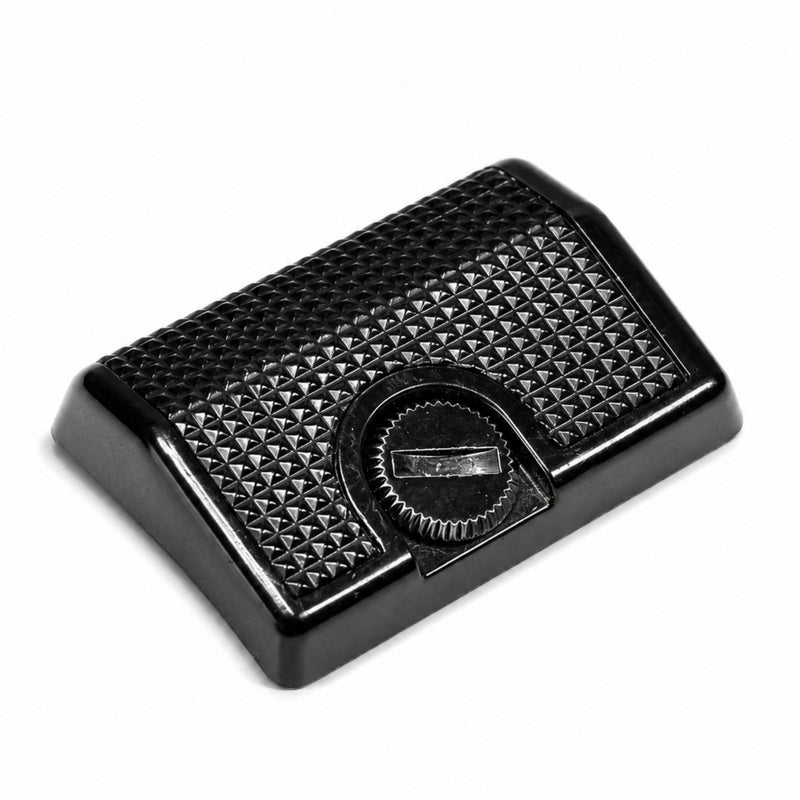 ClubCamera Canon AE-1 Program grip low-angle side view black plastic with textured pyramid surface