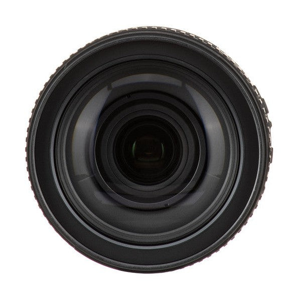 Close-up of Nikon AF-S Nikkor 24-120mm f/4G ED VR front element showing anti-reflective coating layers
