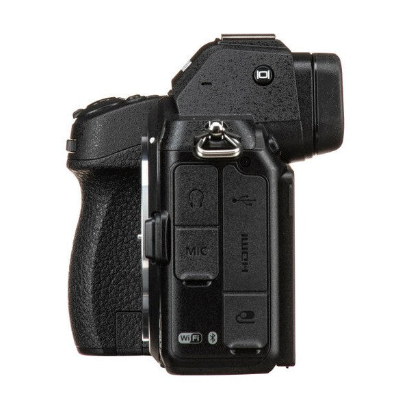 Nikon Z5 rear-right side profile showing port covers and tripod mount