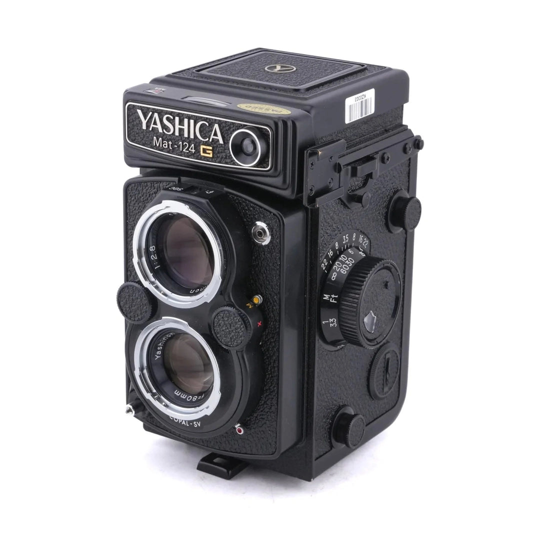 Yashica Mat-124G TLR side angle with aperture dial and engraved lens specifications