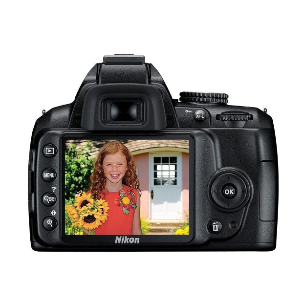 Rear of black Nikon D3000 showing 3.0-inch LCD screen displaying photo at ClubCamera.com