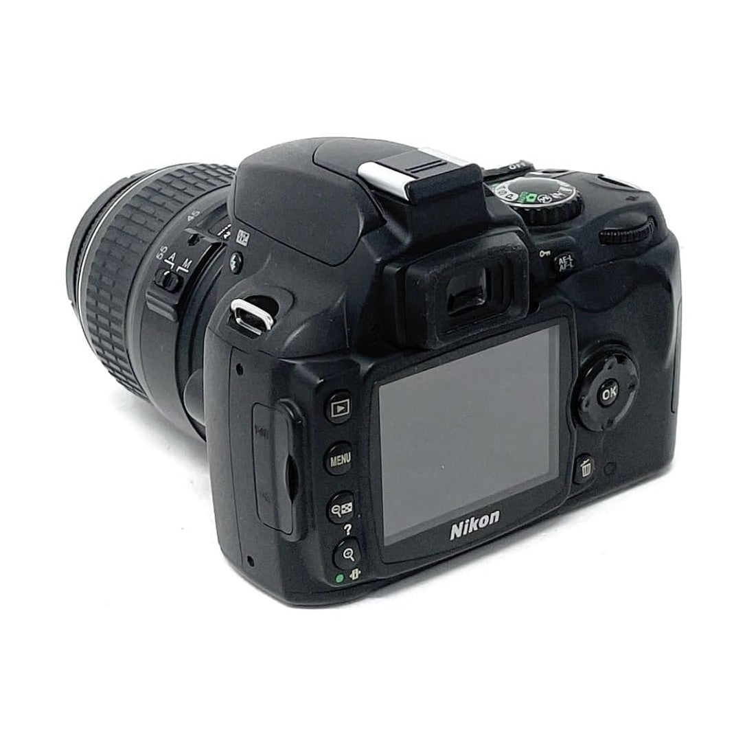 Black Nikon D40 DSLR camera rear view with LCD screen and mode dial by ClubCamera.com