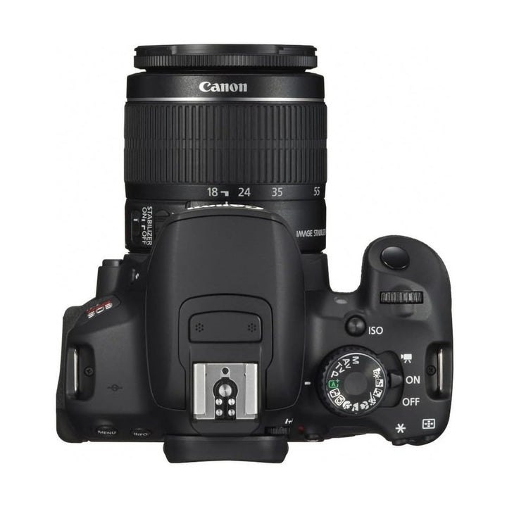 Top view of black Canon EOS Rebel T4i DSLR showing mode dial and hot shoe at ClubCamera.com