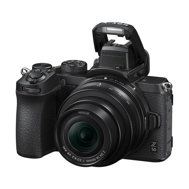 ClubCamera.com black Nikon Z50 with pop-up flash raised and 16-50mm VR lens attached