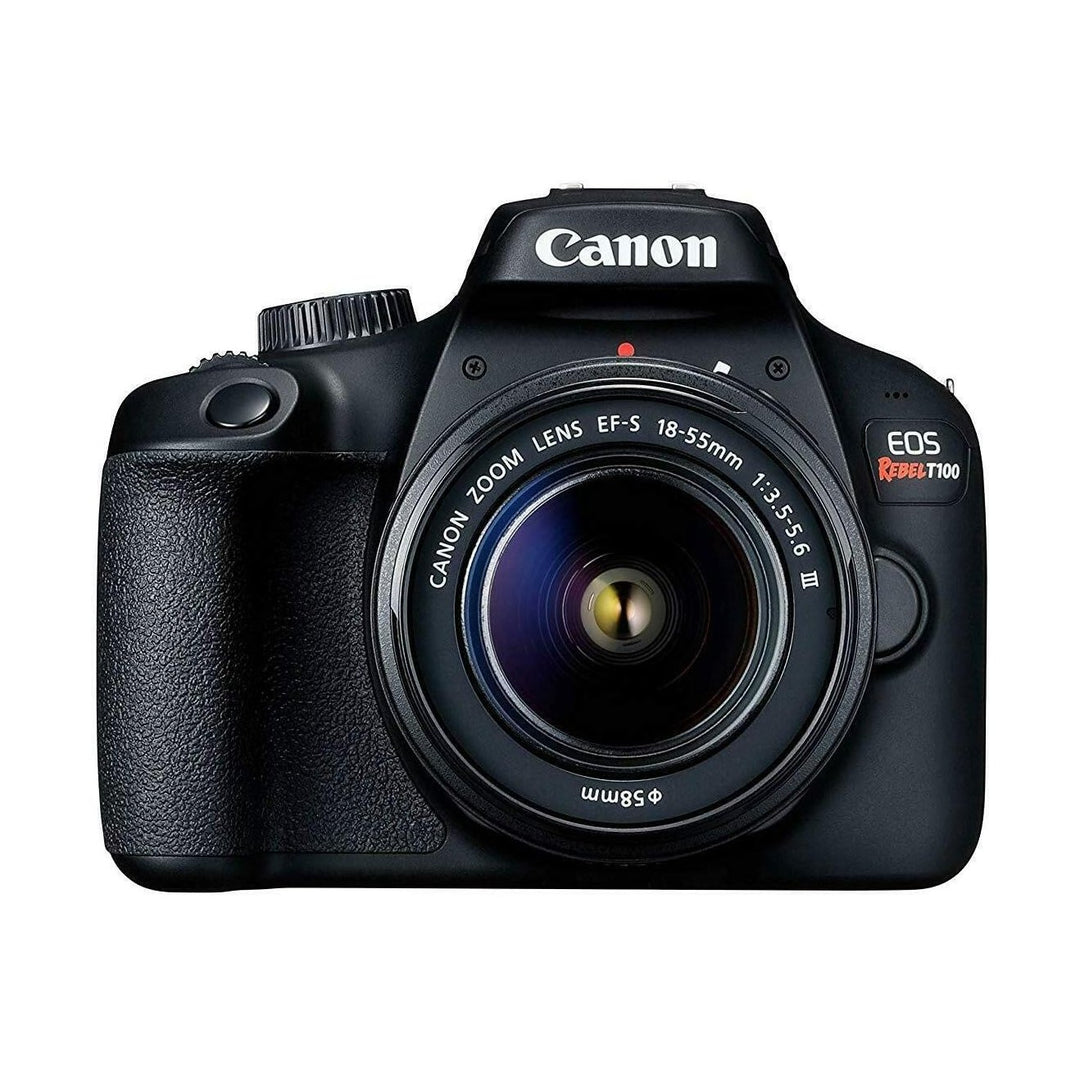 ClubCamera.com black Canon EOS Rebel T100 DSLR with EF-S 18-55mm lens attached showing mode dial and front badge