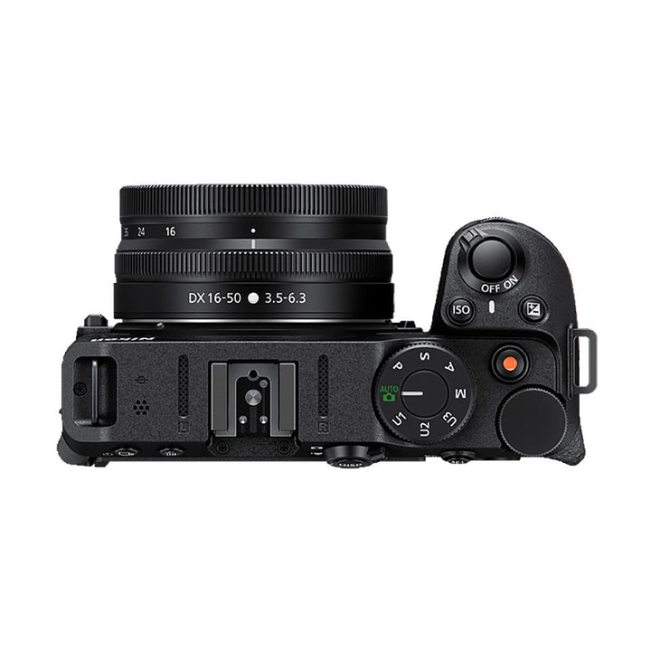 Top-down view of Nikon Z30 mode dial and hot shoe with 16-50mm lens at ClubCamera.com