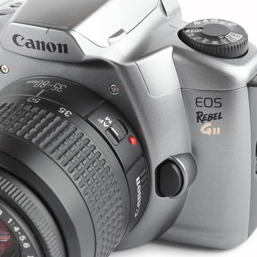 Canon Rebel GII silver film SLR close-up with EF lens mode dial and brushed metal texture from ClubCamera.com