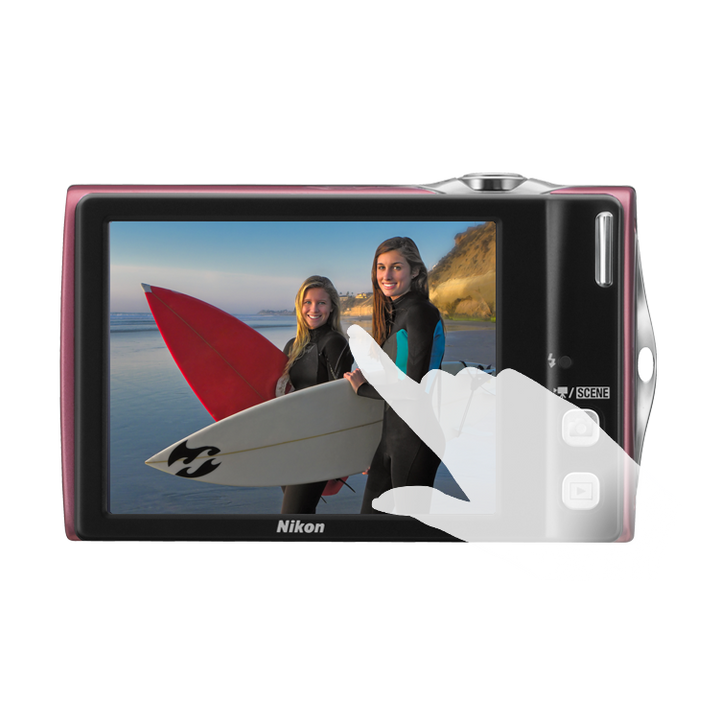 Rear view of ClubCamera.com maroon Nikon Coolpix S4000 featuring 3-inch touch LCD screen displaying beach scene