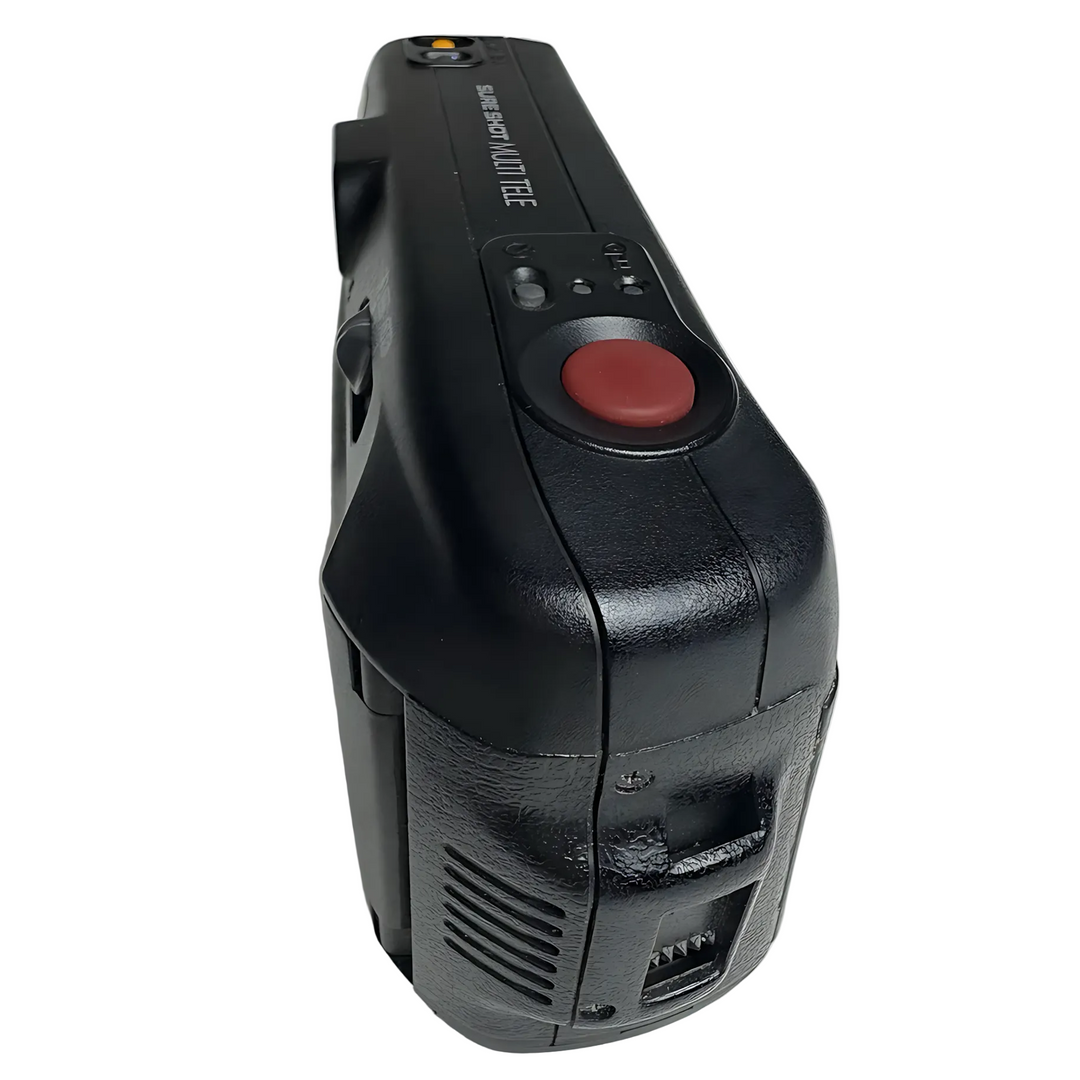 Rear-left view of black Canon Sure Shot Multi Tele showing ergonomic rubberized grip and battery cover from ClubCamera.com
