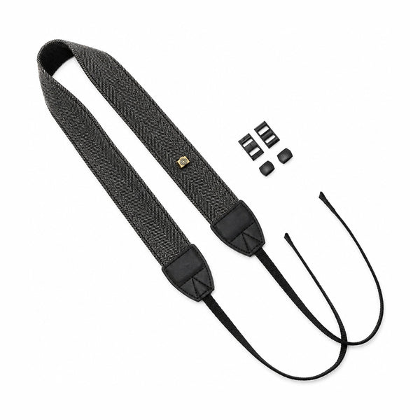 ClubCamera.com black and white herringbone camera neck strap with gold logo plate and leather end caps