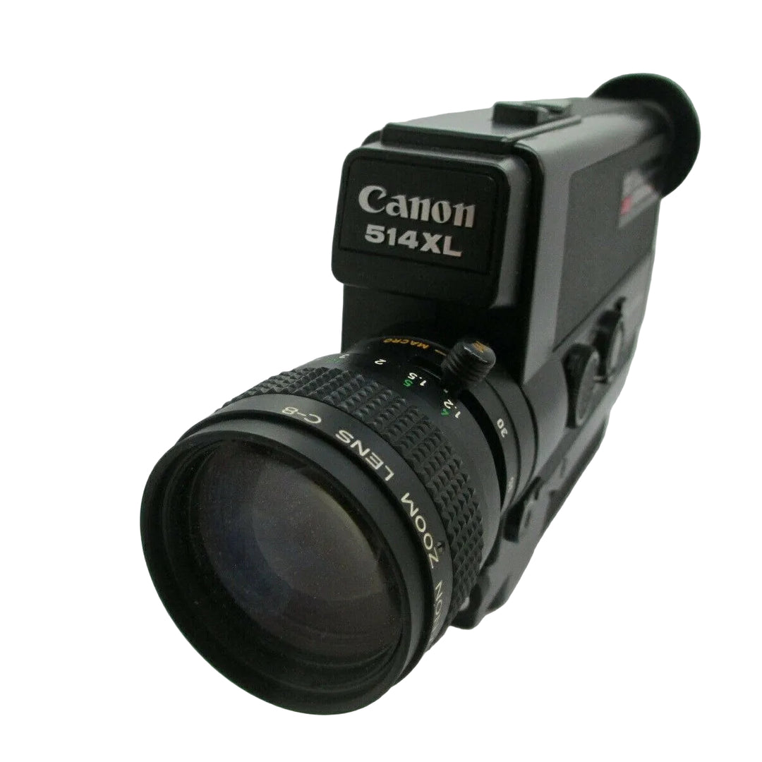 Front-three-quarter angle of Canon 514XL Super 8 movie camera by ClubCamera.com with visible aperture rings
