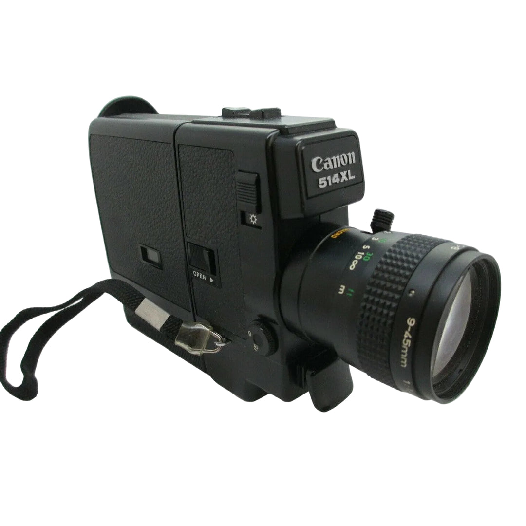 Black Canon 514XL film camera side profile by ClubCamera.com showing pebbled rubber grip and wrist strap