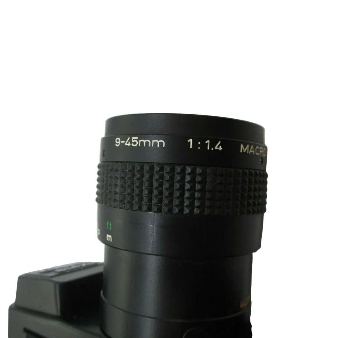Close-up of Canon 514XL 9-45mm f/1.4 macro zoom lens by ClubCamera.com with engraved markings and focus ring