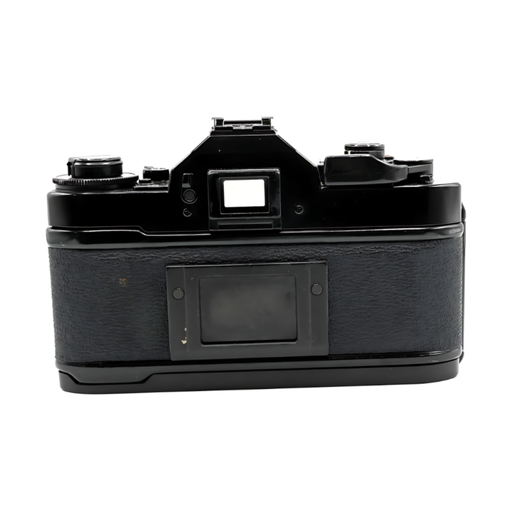 Rear view of vintage black Canon A-1 SLR body without lens showing rewind crank and grip texture at ClubCamera.com