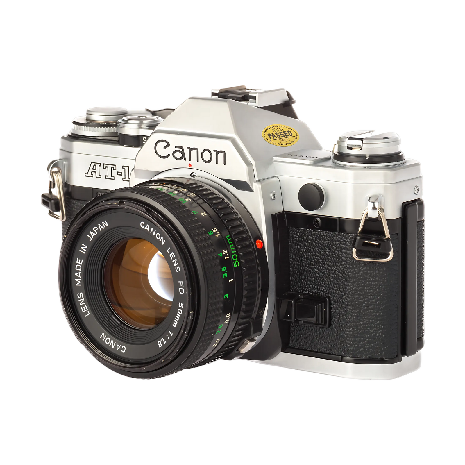 Canon AT-1 front view with FD 50mm f/1.8 lens aperture scale orange white passed sticker at ClubCamera.com