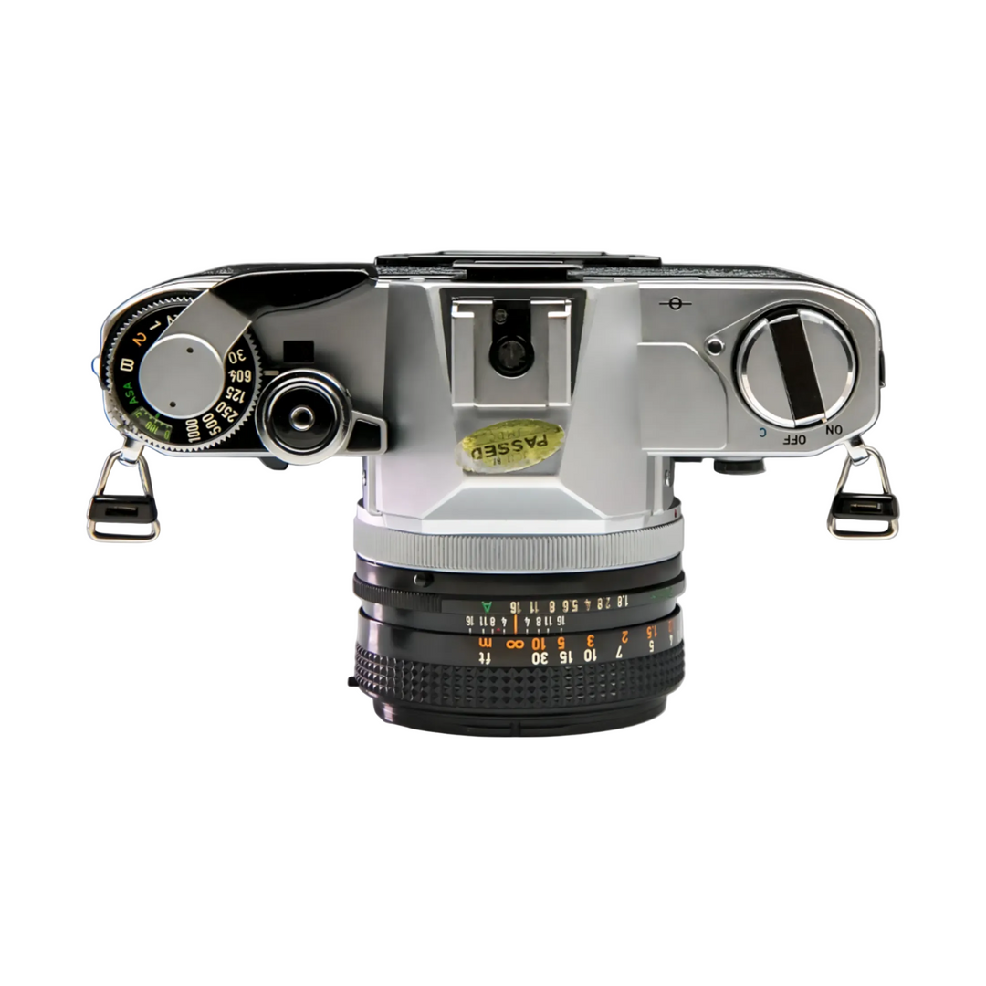 Canon AT-1 shutter speed dial and mode switch ON/OFF/C green markings passed sticker at ClubCamera.com