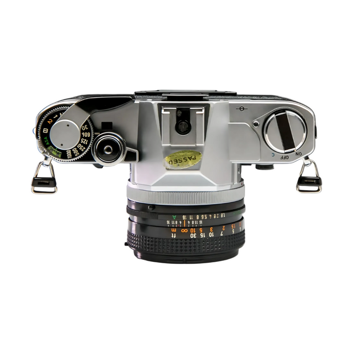 Canon AT-1 shutter speed dial and mode switch ON/OFF/C green markings passed sticker at ClubCamera.com