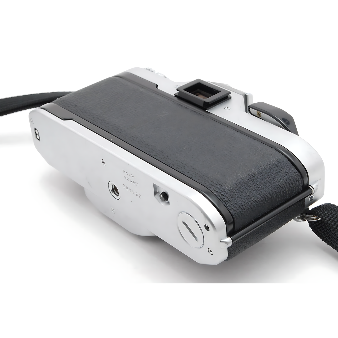 Bottom of Canon AV-1 showing serial number and tripod socket made in Japan at ClubCamera.com