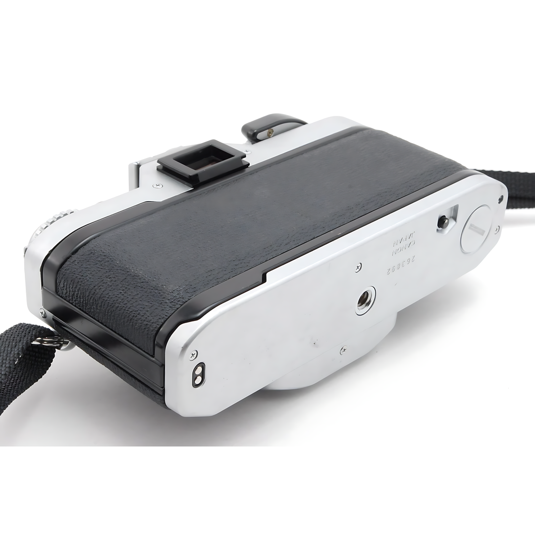 Top rear of silver Canon AV-1 with pentaprism and rewind crank at ClubCamera.com