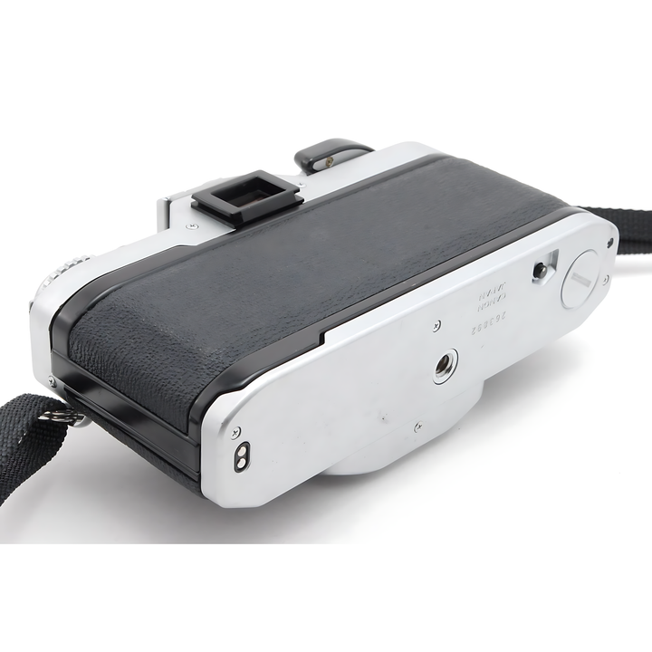 Top rear of silver Canon AV-1 with pentaprism and rewind crank at ClubCamera.com