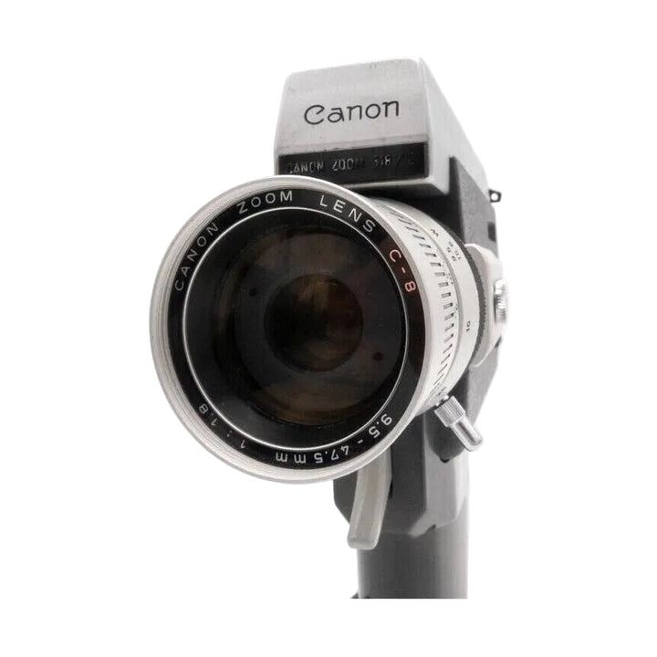 Canon Auto Zoom 518 Super 8 movie camera with fixed handle by ClubCamera.com, silver and black body featuring engraved CANON ZOOM LENS C-8 ring