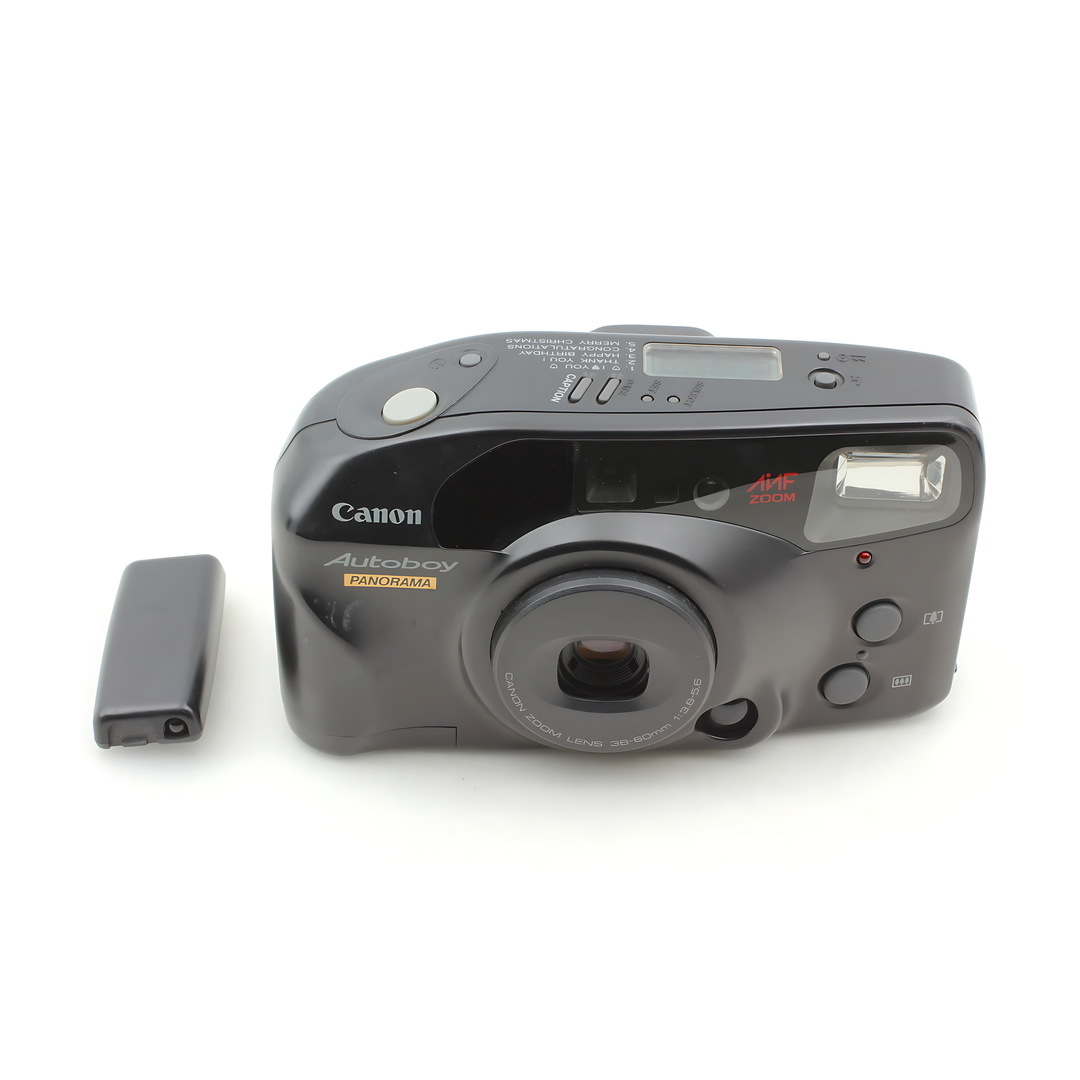 Black Canon Autoboy Panorama 35mm film camera with power zoom lens and caption feature from ClubCamera.com