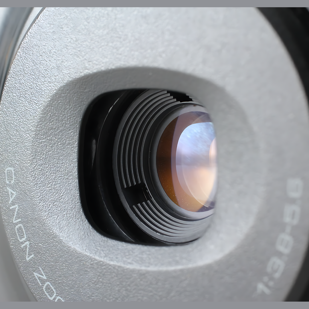 Close-up of Canon Autoboy Panorama 35mm zoom lens barrel showing focus rings and glass elements at ClubCamera.com
