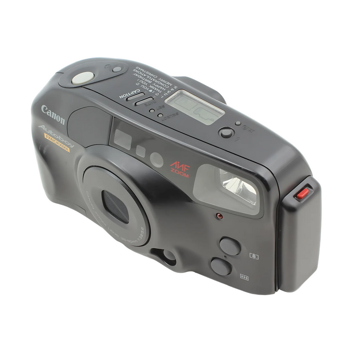 Top-front view of black Canon Autoboy Panorama AAF Zoom 35mm film camera with mode dial and textured grip from ClubCamera.com