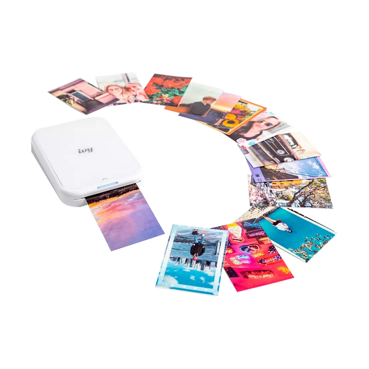 ClubCamera.com Canon Ivy 2 Mini Photo Printer in white printing borderless sunset photo with colorful peel-and-stick ZINK prints
