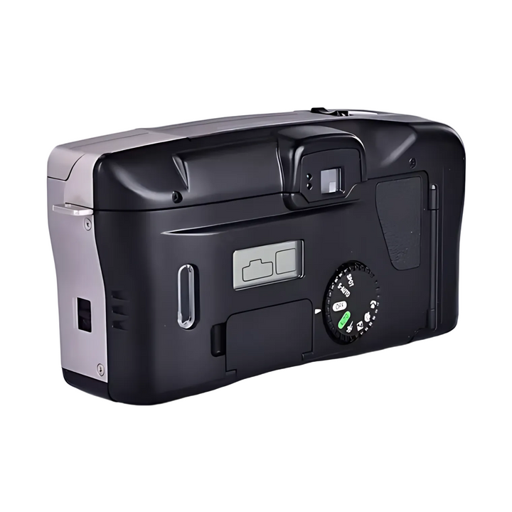 Side-rear angle of black Canon Prima Super 135 displaying mode dial with P, A, M settings and green E indicator light from ClubCamera.com