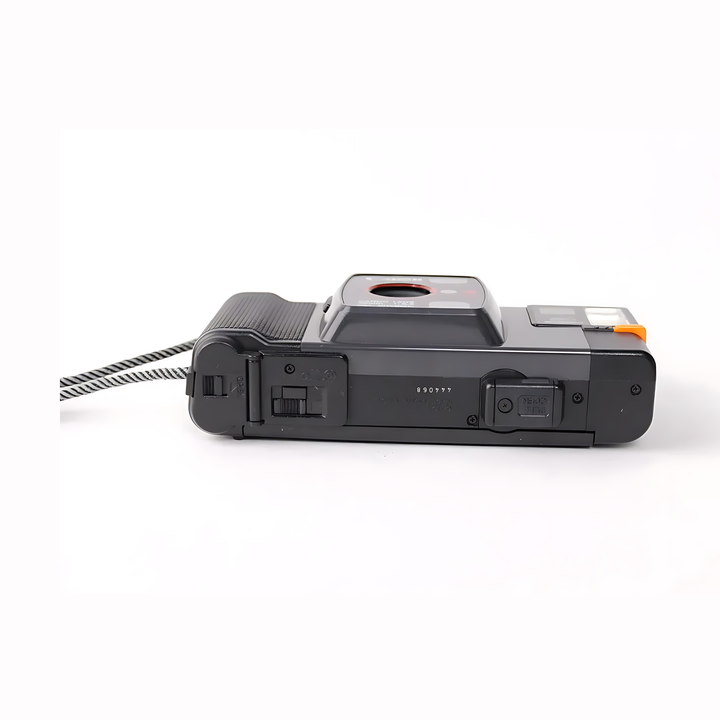 Rear view of Canon Snappy 50 showing ASA film speed dial and film compartment latch at ClubCamera.com