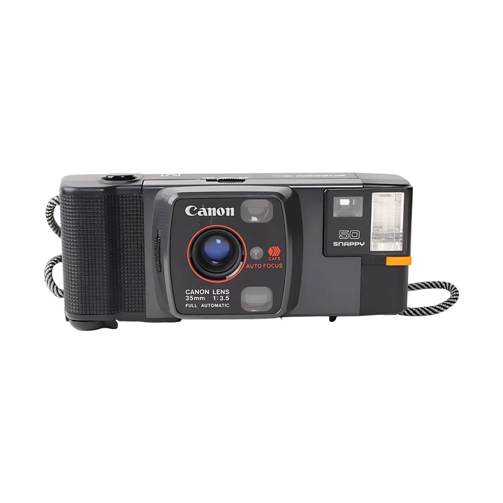 Canon Snappy 50 35mm camera angled to show blue-tinted lens and auto-focus indicator at ClubCamera.com