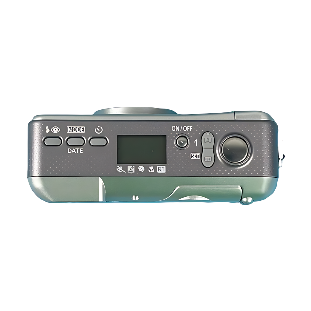 Top control layout of silver Canon 115u film camera with LCD screen and mode dial at ClubCamera.com