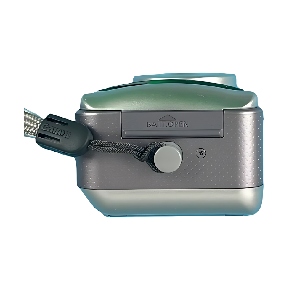 Side profile silver Canon 115u showing battery compartment and textured grip at ClubCamera.com