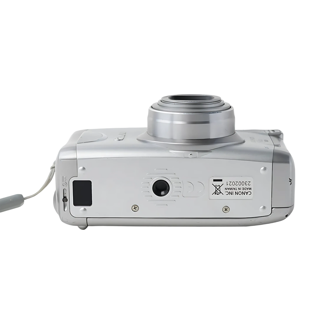 Rear view silver Canon Sure Shot 150u showing battery compartment, regulatory label, and Made in Taiwan text at ClubCamera.com