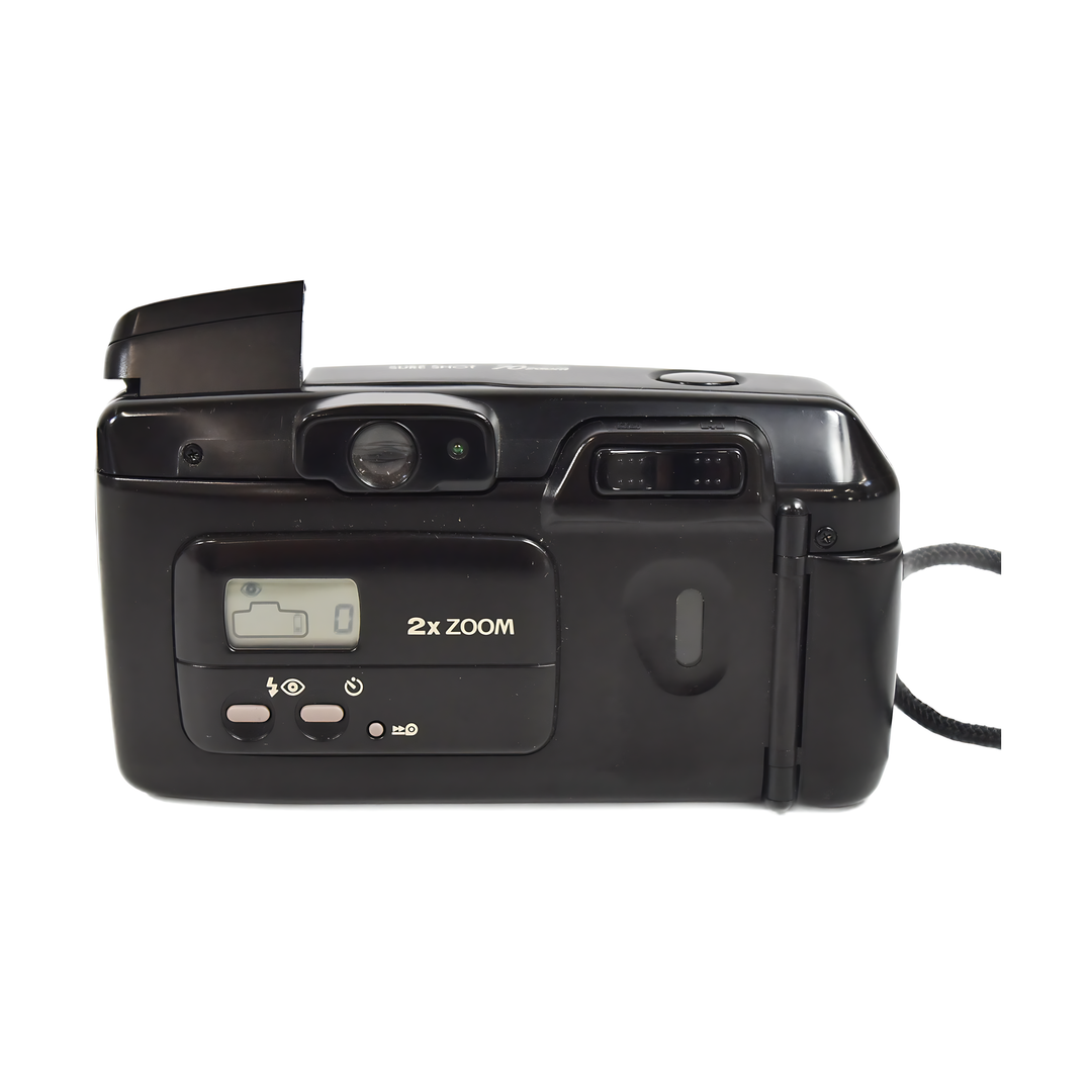 Rear view of black Canon Sure Shot 70 Zoom film camera with LCD display pink buttons and green autofocus light at ClubCamera.com