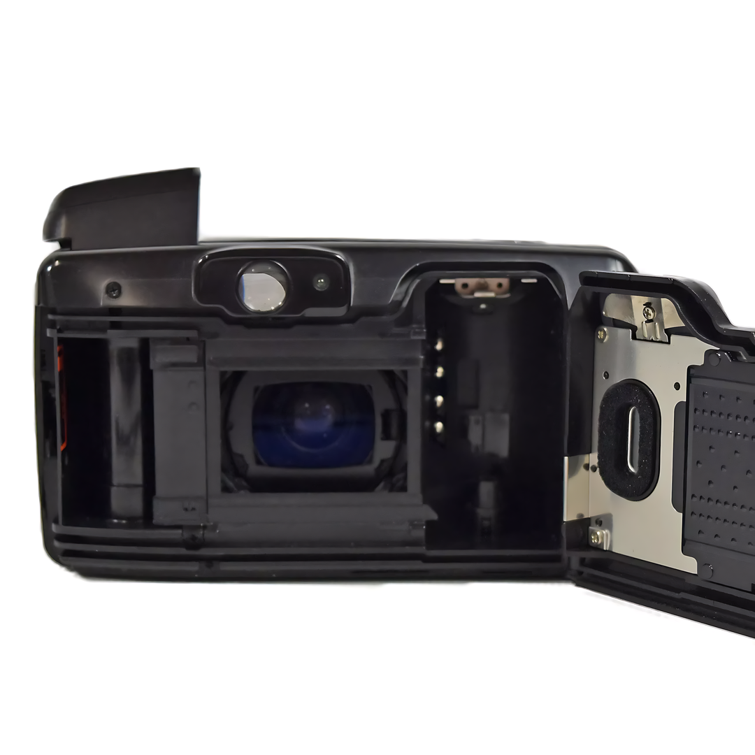 Canon Sure Shot 70 Zoom 35mm film camera rear view with open back panel showing blue lens and silver battery compartment at ClubCamera.com