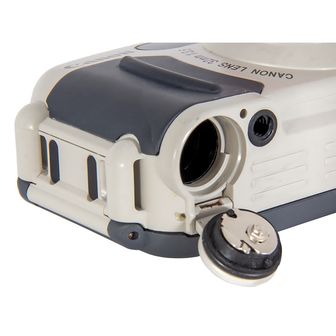 Canon Sure Shot A-1 battery compartment open showing rubber seal and coin cell holder for waterproof maintenance