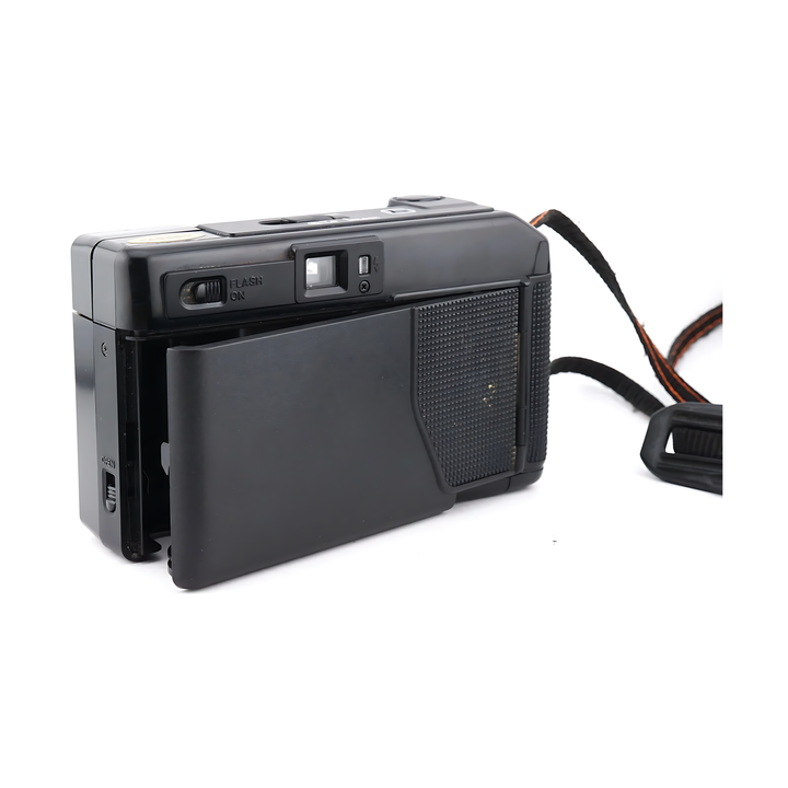 Open back panel black Canon AF35M II 35mm film camera showing film compartment
