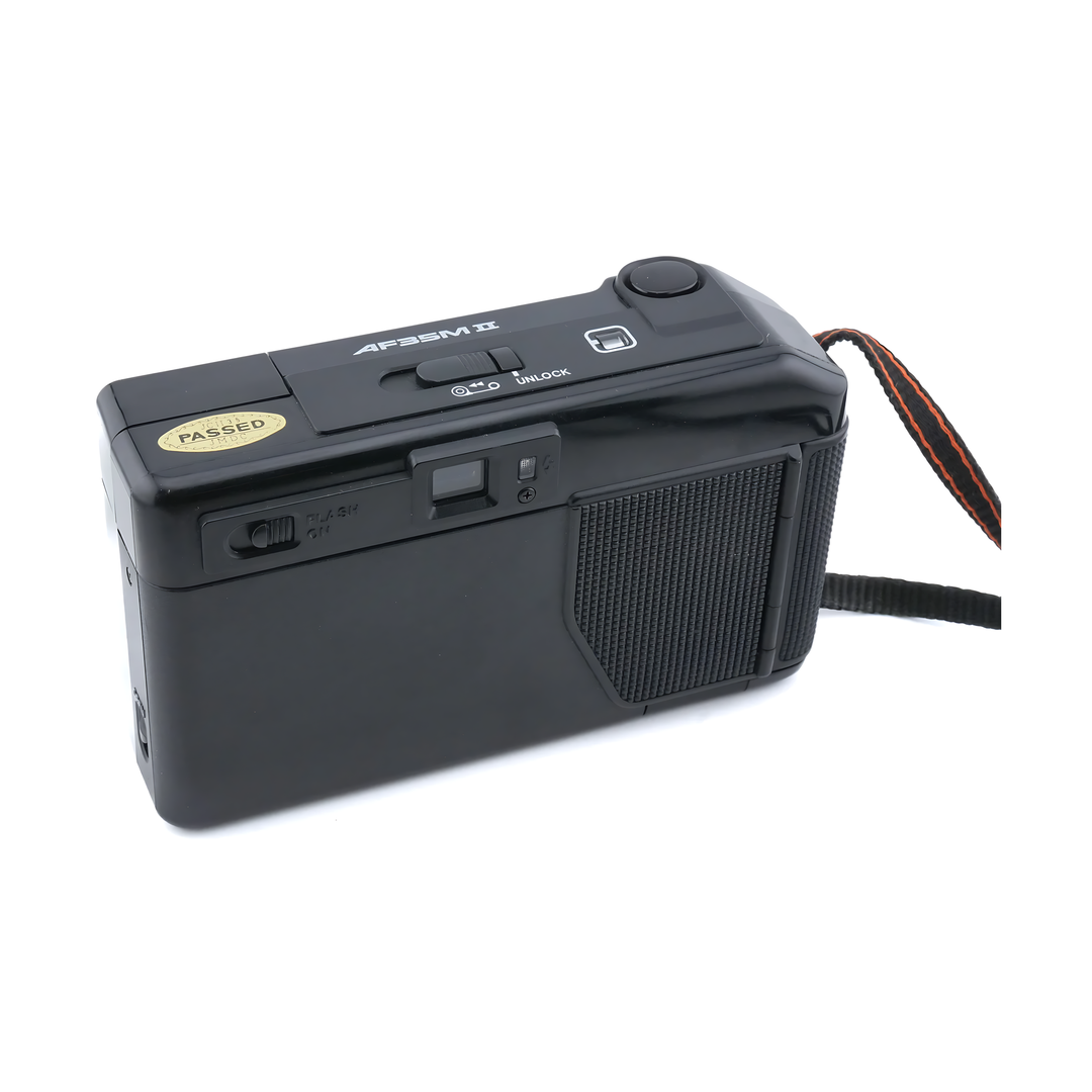 Black Canon AF35M II rear angle displaying tested passed gold sticker