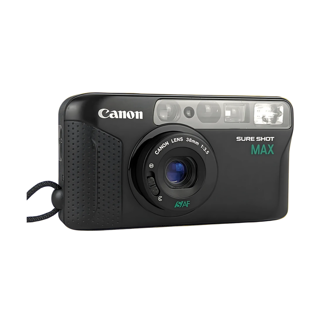 Three-quarter front view of black Canon Sure Shot Max 35mm film camera with textured grip and flash unit from ClubCamera.com