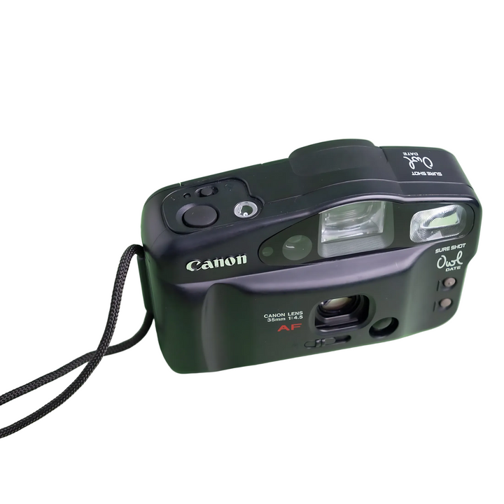 Canon Sure Shot Owl 35mm film camera front view with built-in flash and wrist strap at ClubCamera.com